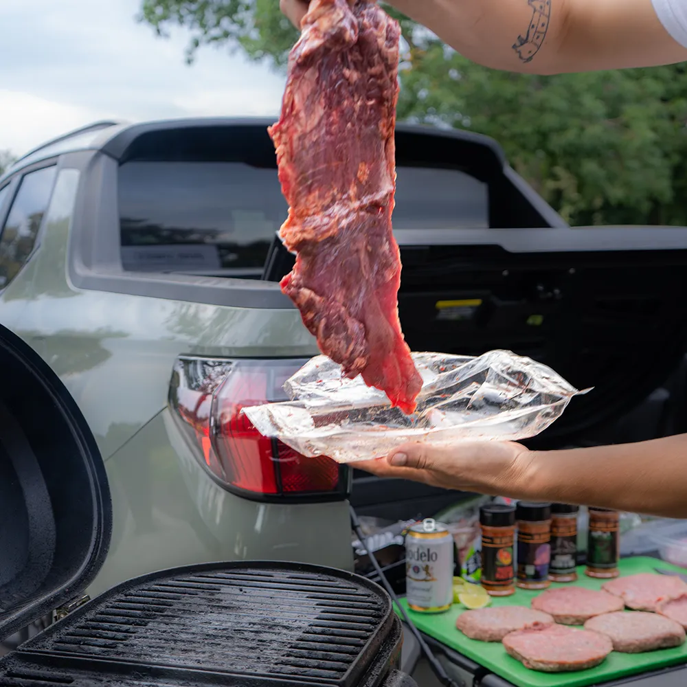 Centennial Cuts Premium Tailgater bundle - showing marinated skirt steak raw